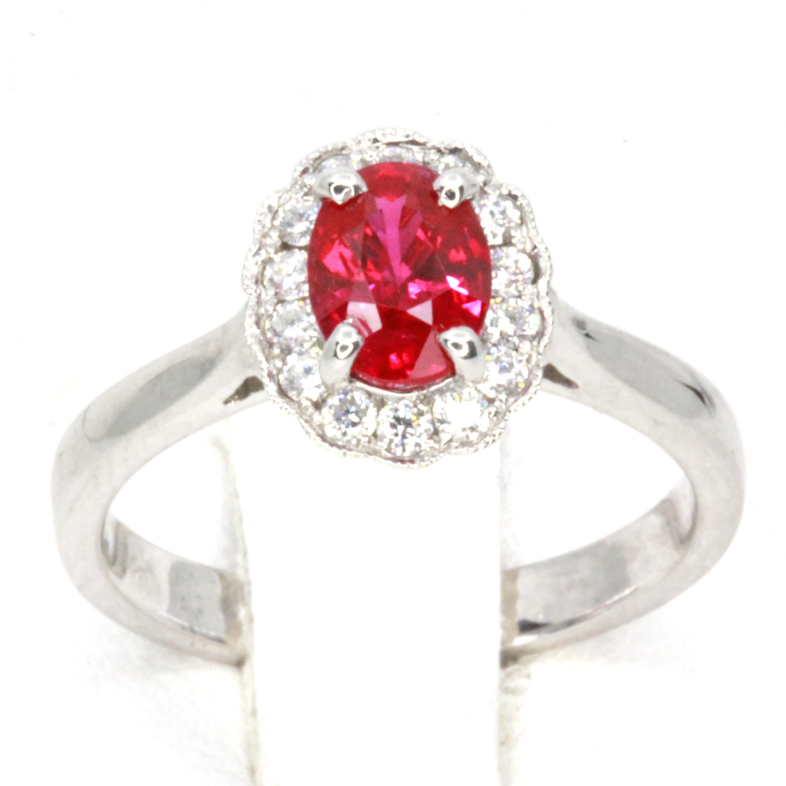 oval ruby halo ring