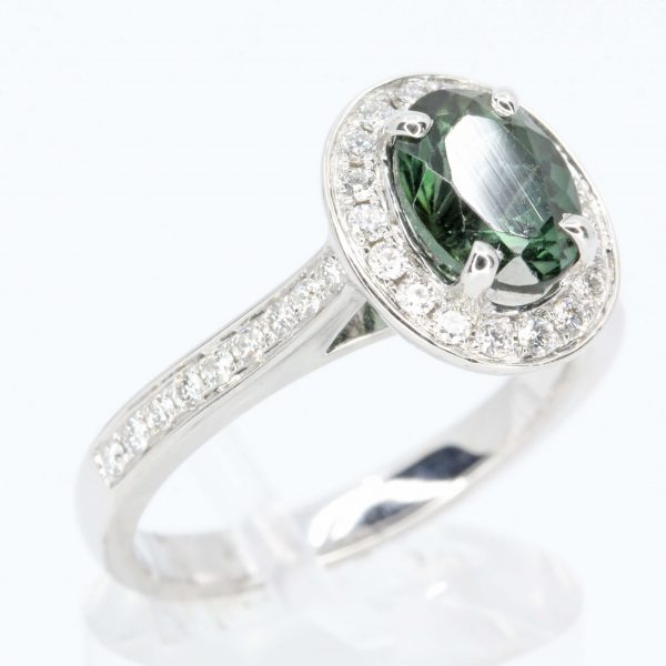 Oval Shape Green Tourmaline Ring with Accents of Diamonds Set in 18ct White Gold