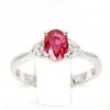 Oval Shape Ruby Ring with Accents of Diamonds Set in 18ct White Gold