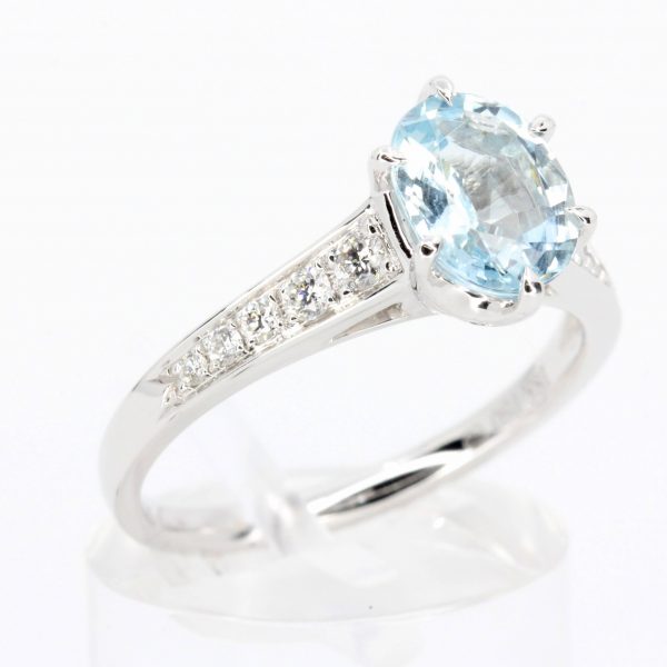 Oval Shape Aquamarine Ring with Accents of Diamonds Set in 18ct White Gold
