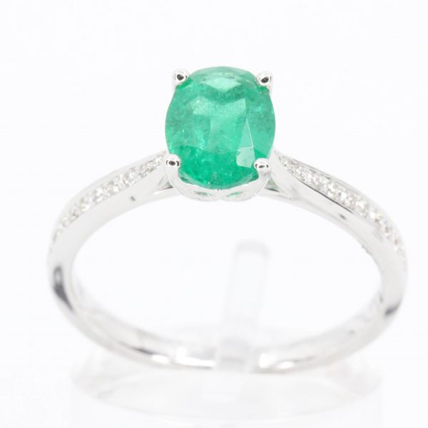 Oval Cut Solitaire Emerald Ring with Accents of Diamonds Set in 18ct White Gold