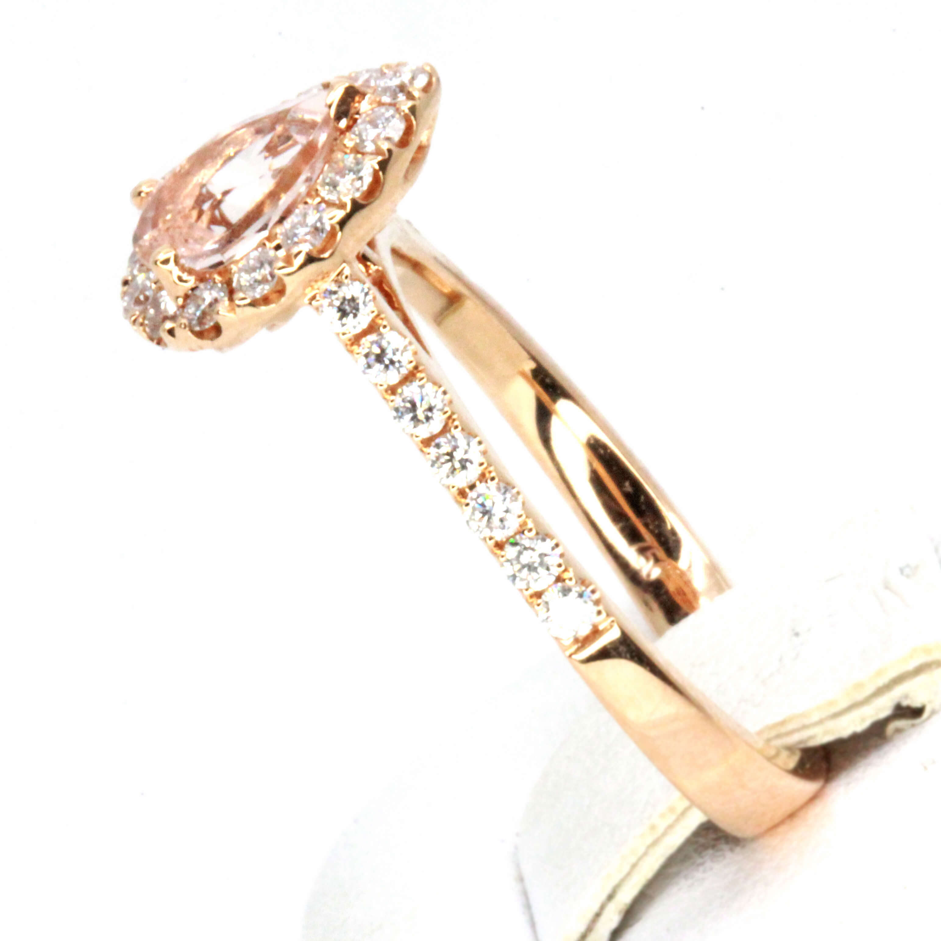 Pear Cut Ring with Accents of Diamonds Set in