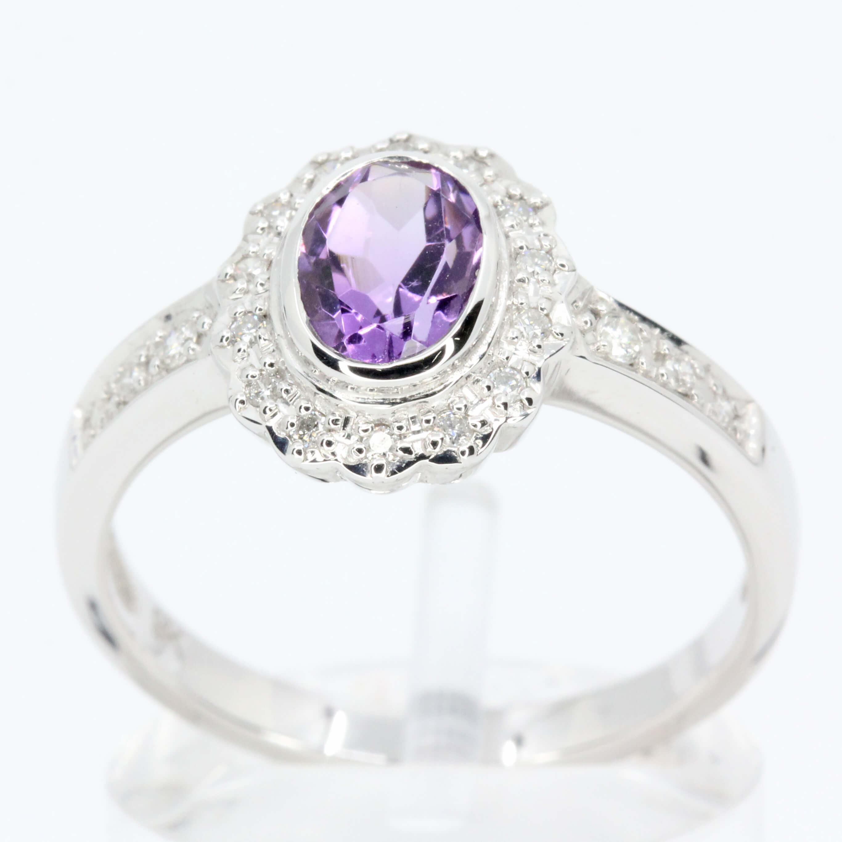 Oval Shape Amethyst Ring with Accents of Diamonds Set in