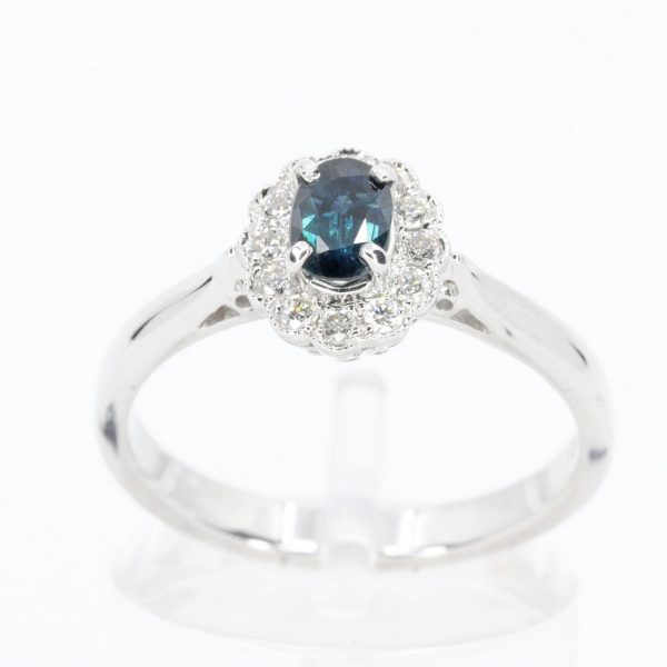 Oval Shape Australian Sapphire Ring with Grain of Diamonds Set in 18ct White Gold