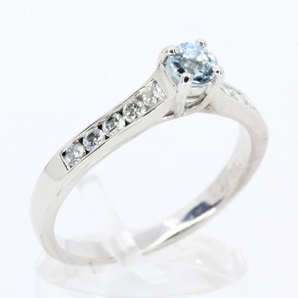 Round Cut Aquamarine Ring with Accents of Diamonds Set in 18ct White Gold