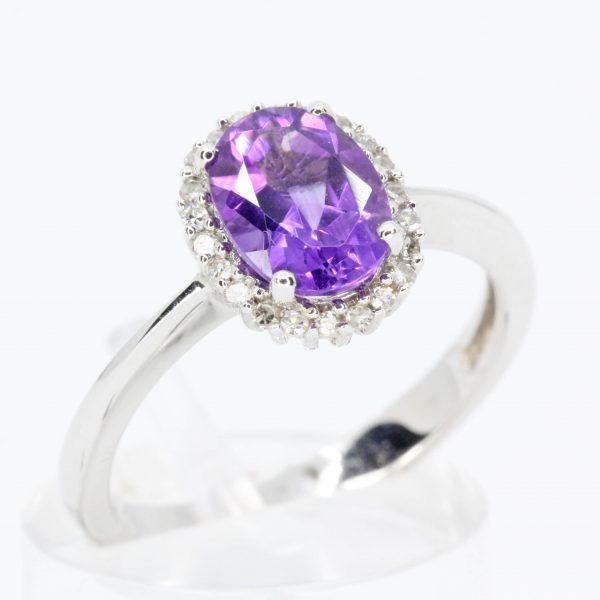 Oval Shape Amethyst Ring with Halo of Diamonds Set in 18ct White Gold