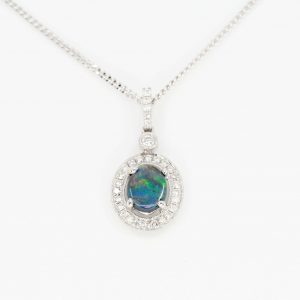 val Black Opal Pendant with Halo of Diamonds set in 18ct White Gold