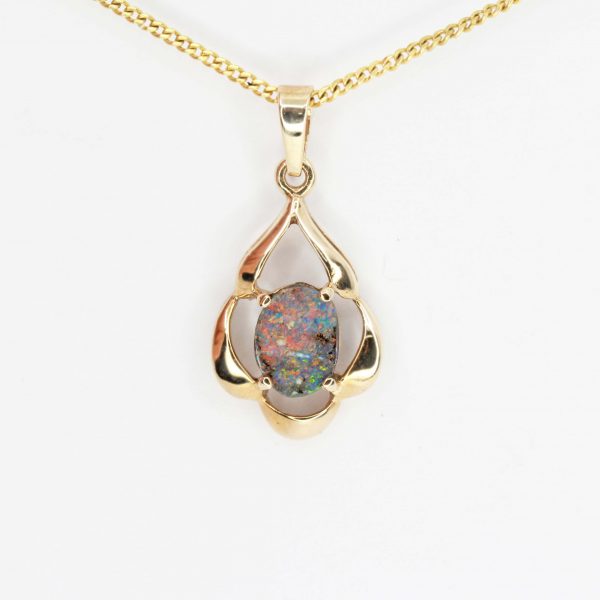 Oval Boulder Opal Pendant set in 9ct Yellow Gold