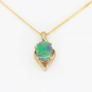 Black Opal Pendant with Diamonds set in 9ct Yellow Gold