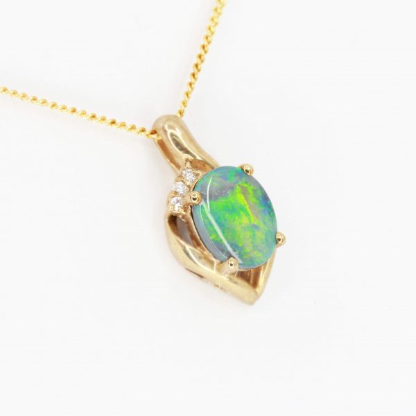 Black Opal Pendant with Diamonds set in 9ct Yellow Gold