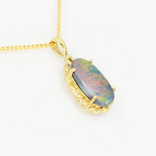 Black Opal Pendant set in 14ct Yellow Gold