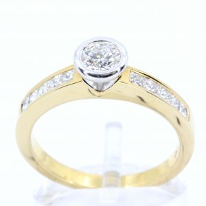 Round Brilliant Cut Diamond Ring with Channel Set Diamonds Accents set in 18ct Two Tone Gold