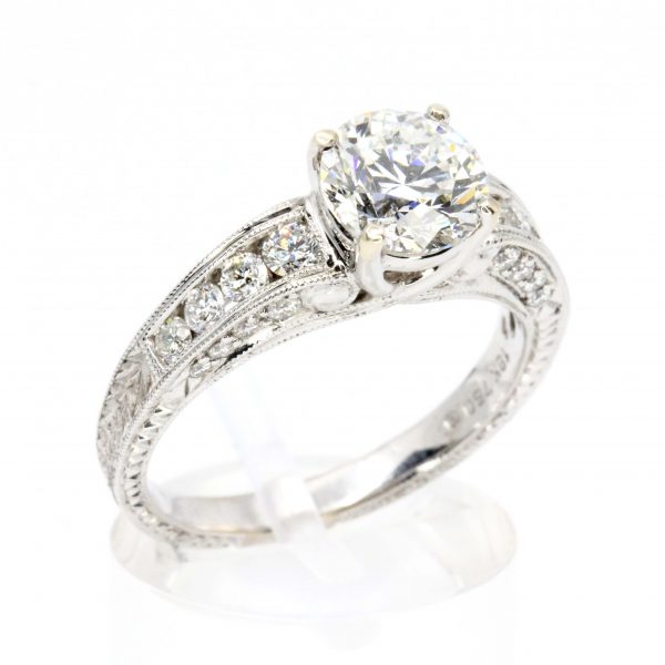 Round Brilliant Cut Diamond Ring with Channel Set Diamonds Accents set in 18ct White Gold