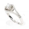 Round Brilliant Cut Diamond Ring with Halo of Diamonds set in 18ct White Gold