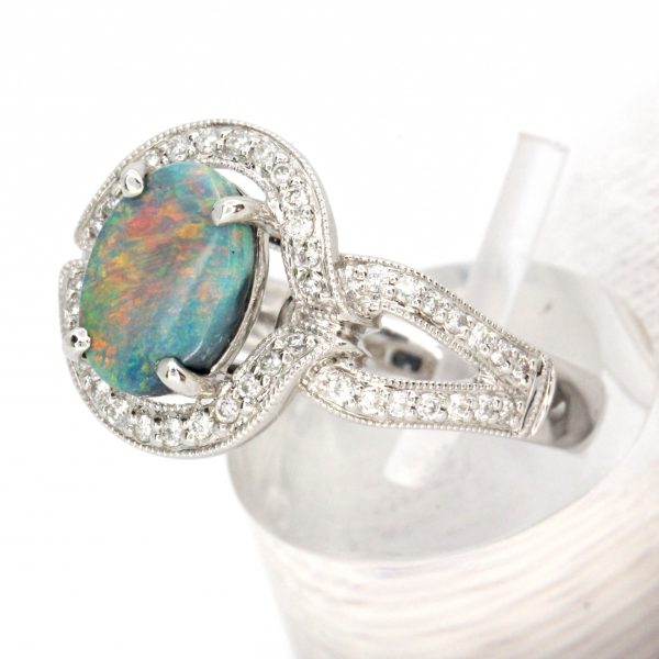 Oval Grey Opal Ring with Halo of Diamonds set in 18ct White Gold
