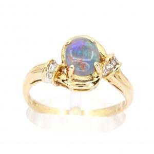 Oval Black Opal Ring with Halo of Diamonds set in 18ct Yellow Gold