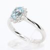 round cut emerald diamond ring
