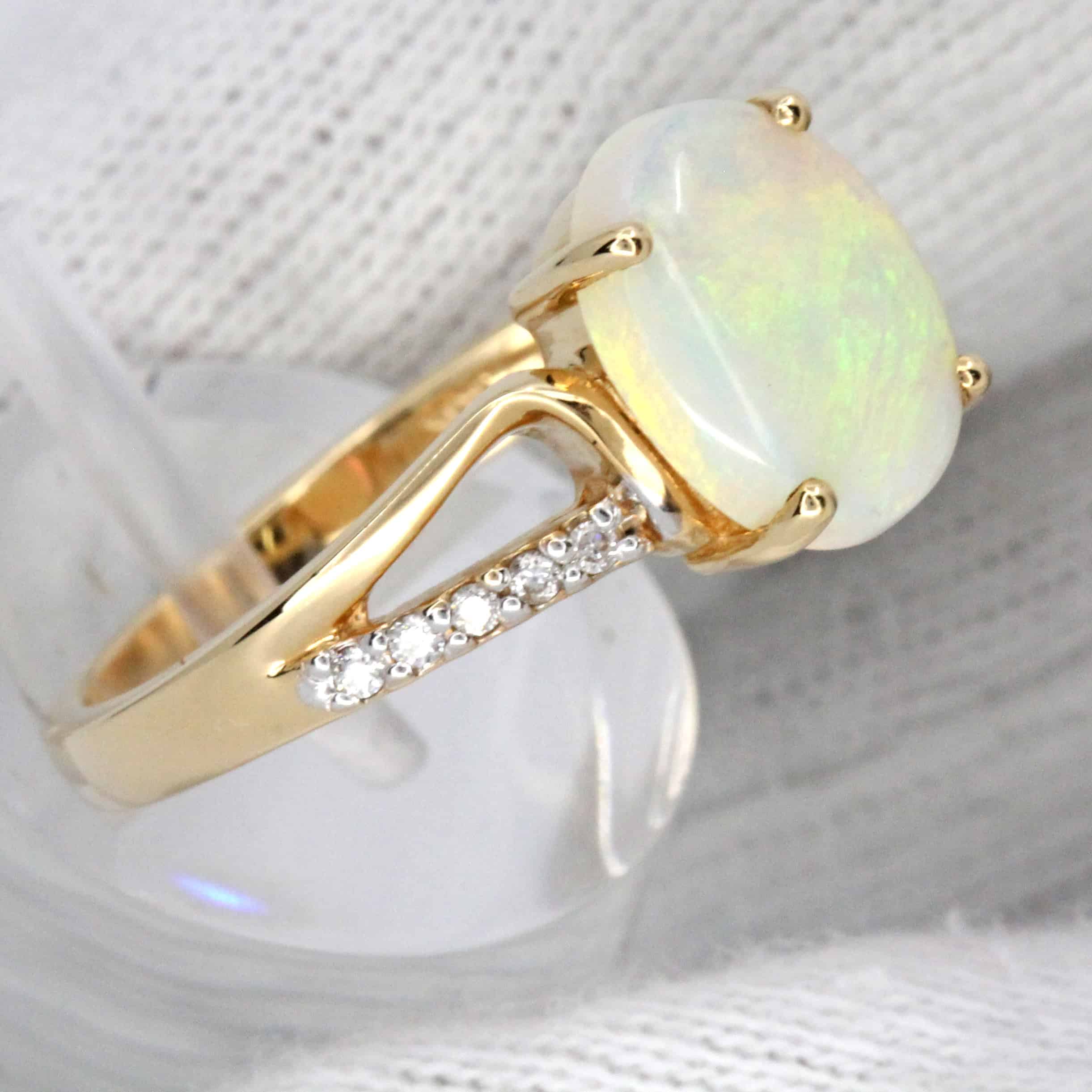 White Opal Ring with Diamond Accents Set in 14ct Yellow Gold Allgem